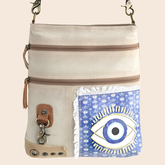 DISTRESSED EVIL EYE CROSSBODY BAG
