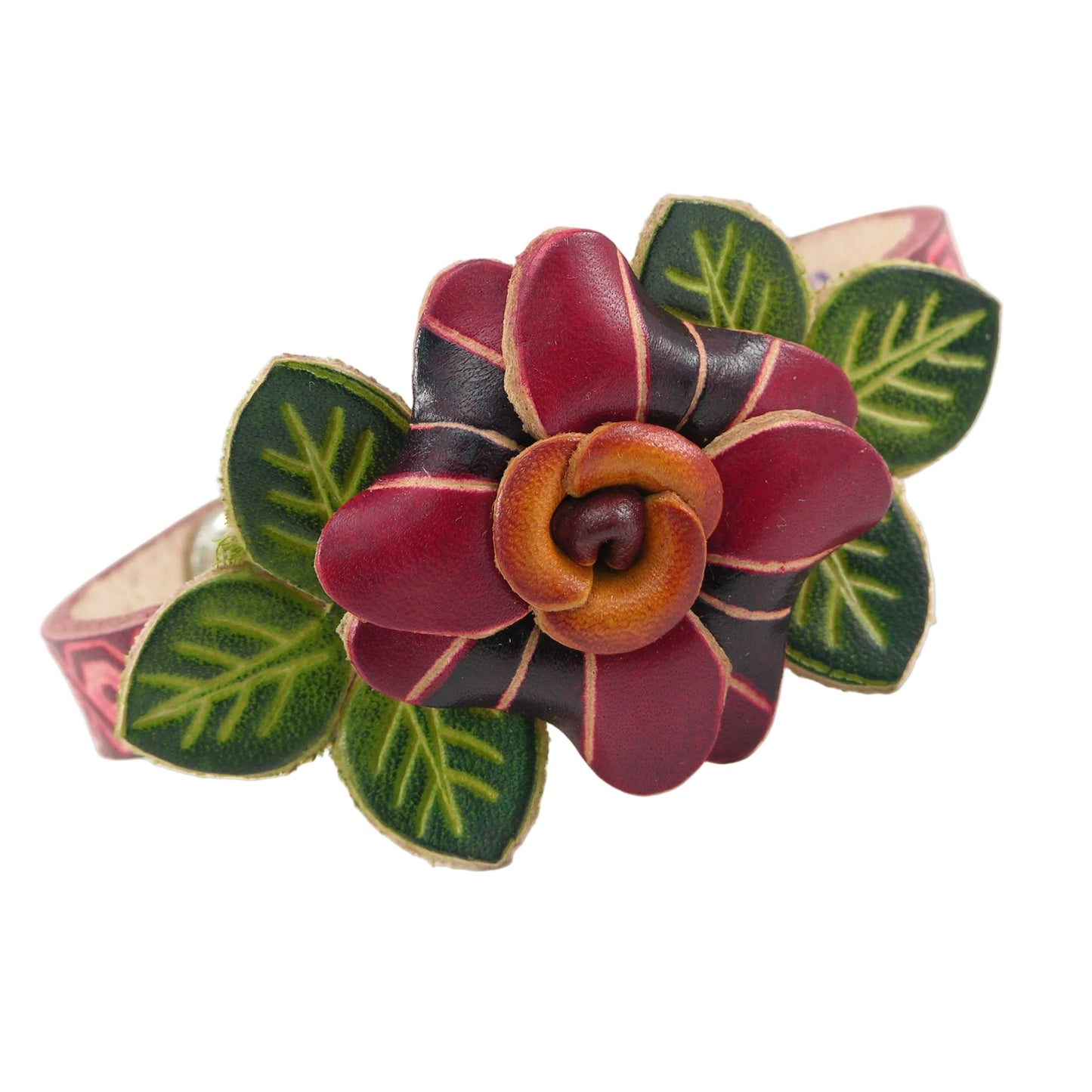 A handmade leather flower bracelet on a white background. The bracelet features a large central flower with burgundy and purple and pink petals, a brown center, and green leaves with light green veins, all outlined in tan.
