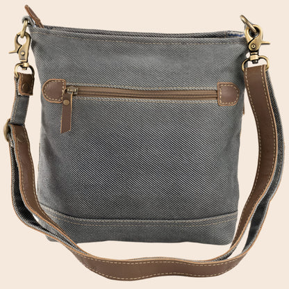 Gray shoulder bag with brown leather accents on a white background