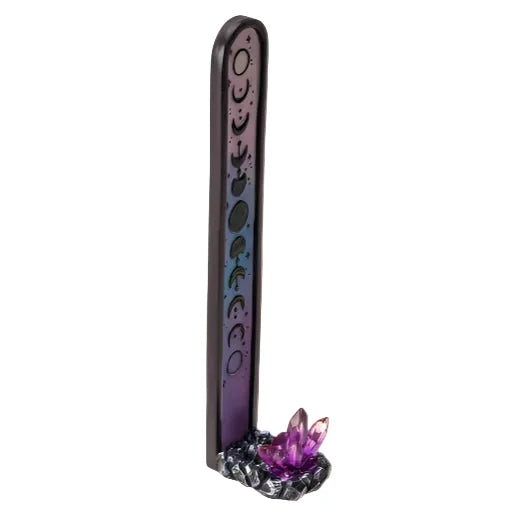 Decorative incense stick holder with purple crystal on a white background