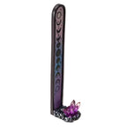 Decorative incense stick holder with purple crystal on a white background