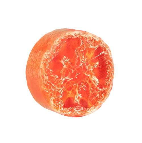 Orange soap with a unique texture on a white background