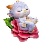 Sleeping Mythical Baby Dragon on Pink Flower Figurine