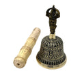 Decorative bell with wooden handle on a white background
