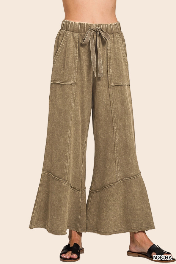 Exposed-seam flare hem pants with pockets