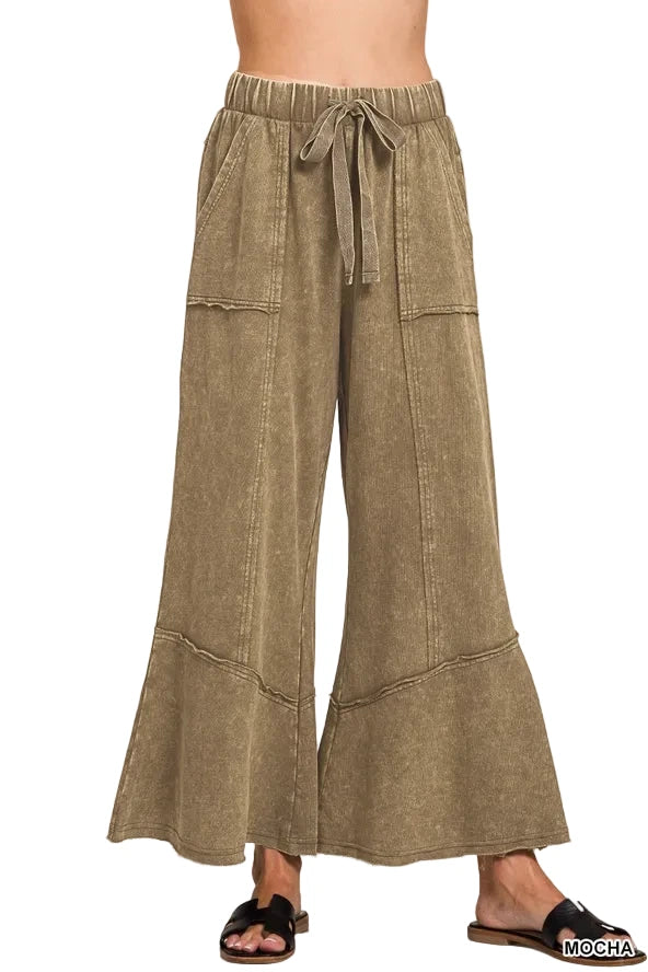 Exposed-seam flare hem pants with pockets