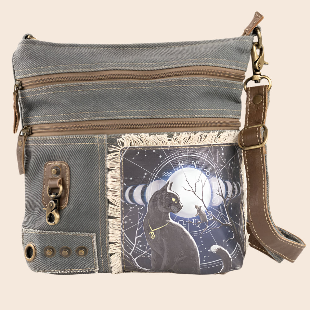 Gray crossbody bag with a cat and moon design on a white background