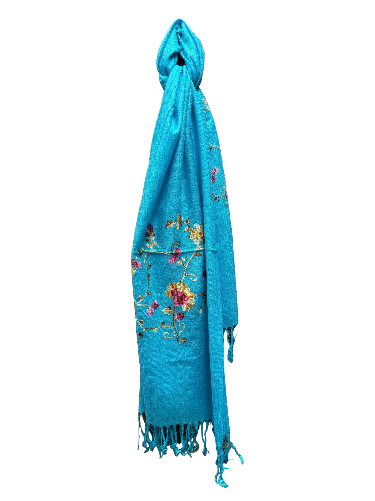 A turquoise blue scarf with colorful floral embroidery and fringe on a white background.